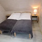 In By Sea And Vakantiehuis